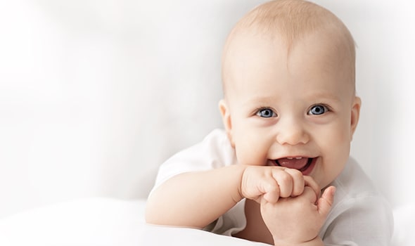 Smiley baby on white background